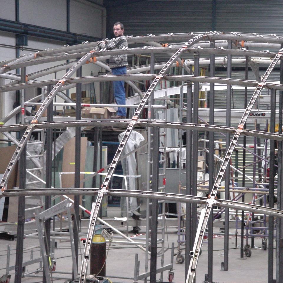 Lens-shaped glass roof over Saint Lazare metro station, framework